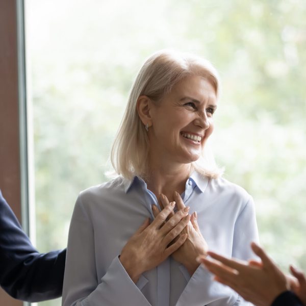 Middle-aged businesswoman get congrats and compliments from multiethnic colleagues Why Emotional intelligence is the Leadership Skill that matters most now